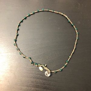 Crotchet necklace with dark green beads